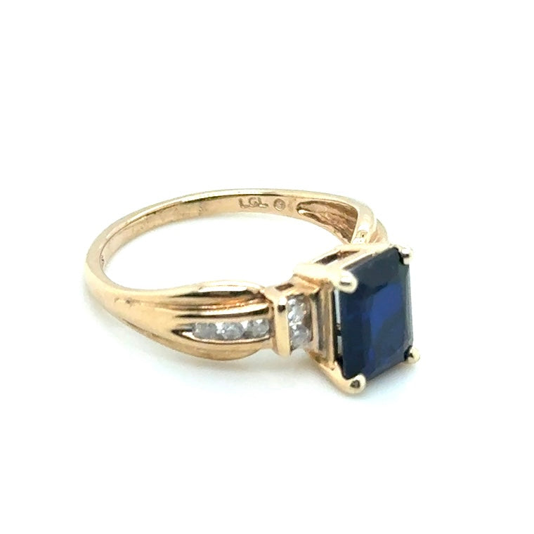 10k Yellow Gold Synthetic Sapphire and Diamonds Ring
