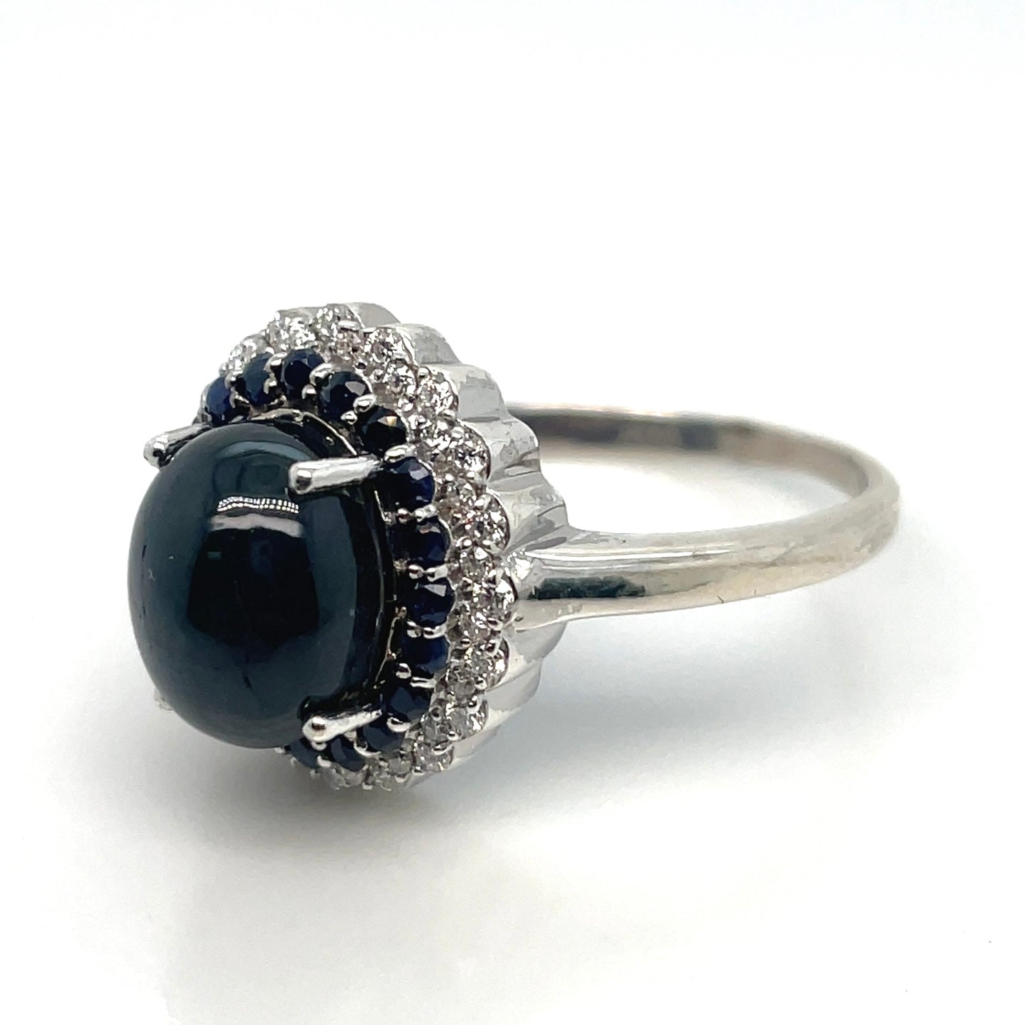 Round White Cubic Zirconia, Round Blue Sapphire, Central Cabochon Cut Sapphire Stone in Silver Ring
