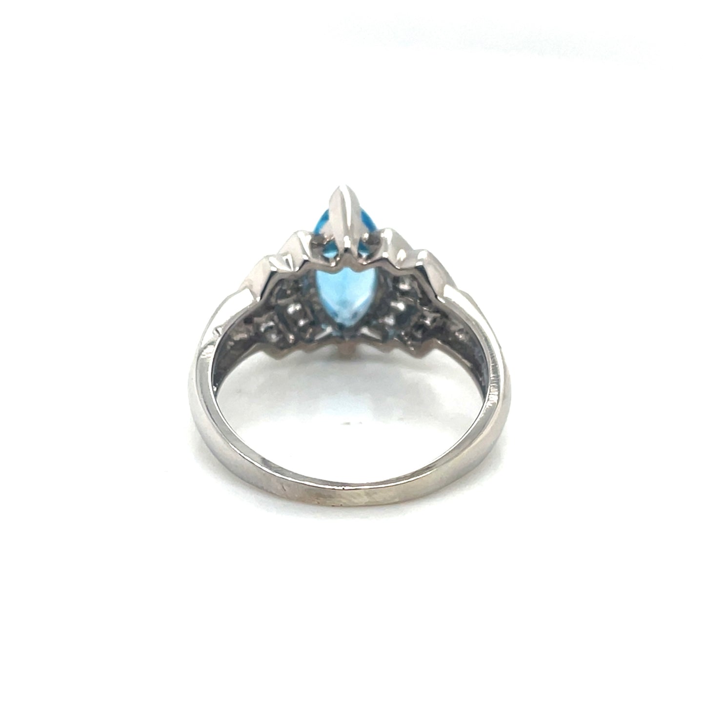 10k White Gold Topaz and 0.30 CT TW Diamonds Ring