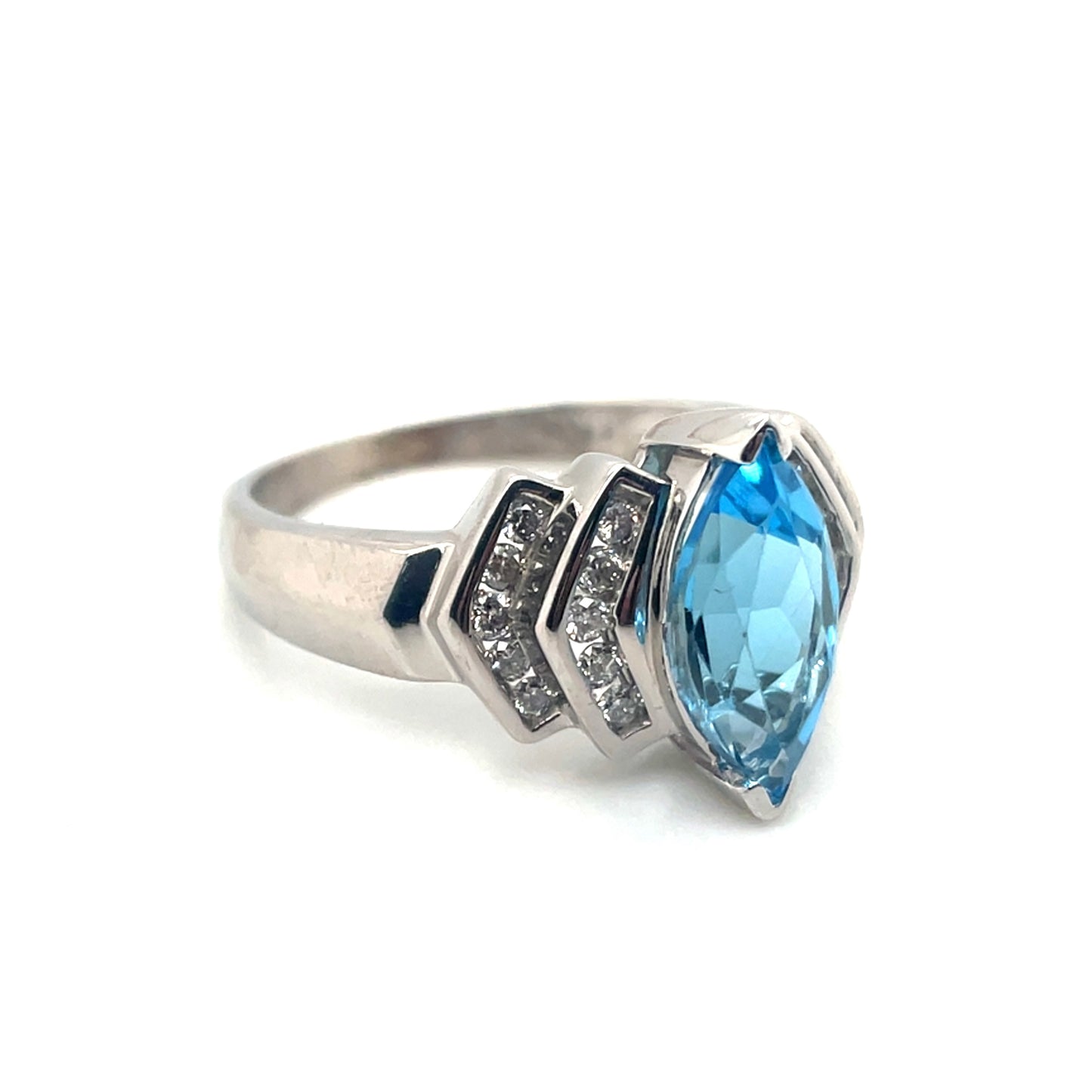 10k White Gold Topaz and 0.30 CT TW Diamonds Ring