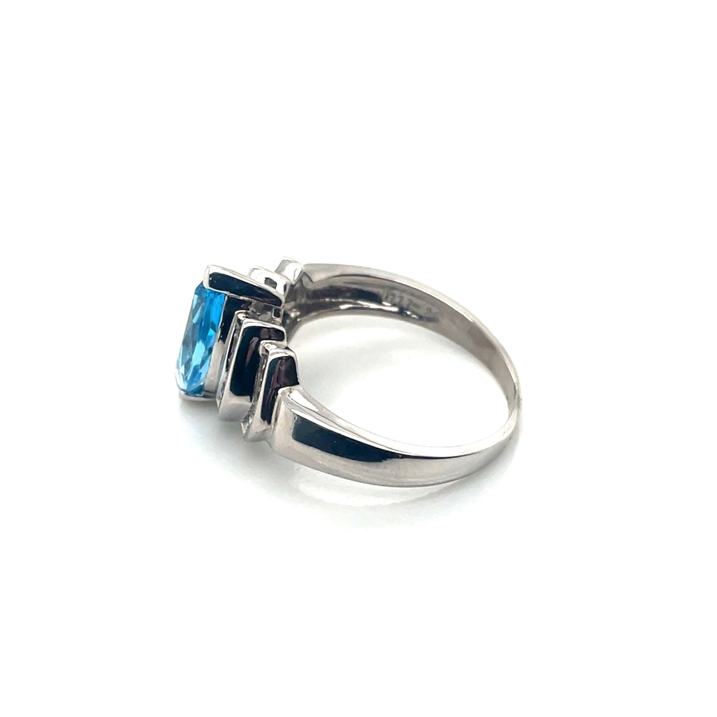 10k White Gold Topaz and 0.30 CT TW Diamonds Ring