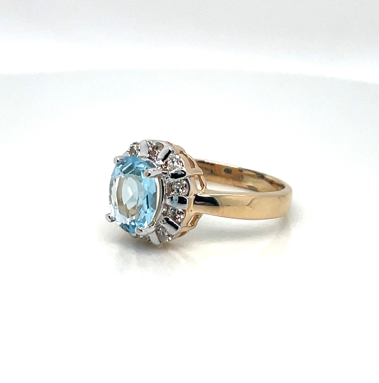 14k Yellow Gold Sky Blue Topaz Lady’s Diamond Ring